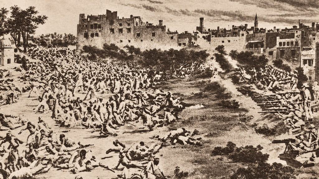 Tropas britânicas atiram contra multidão reunida em Amritsar, no massacre de Jallianwala Bagh