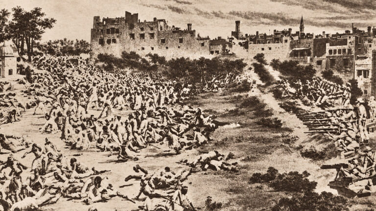 Tropas britânicas atiram contra multidão reunida em Amritsar, no massacre de Jallianwala Bagh